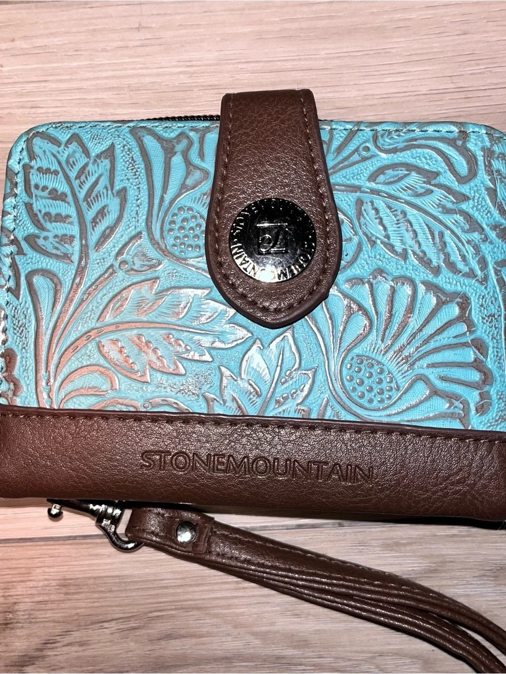 Stone Mountain Accessories Turquoise and Brown Embossed Floral Wristlet Wallet